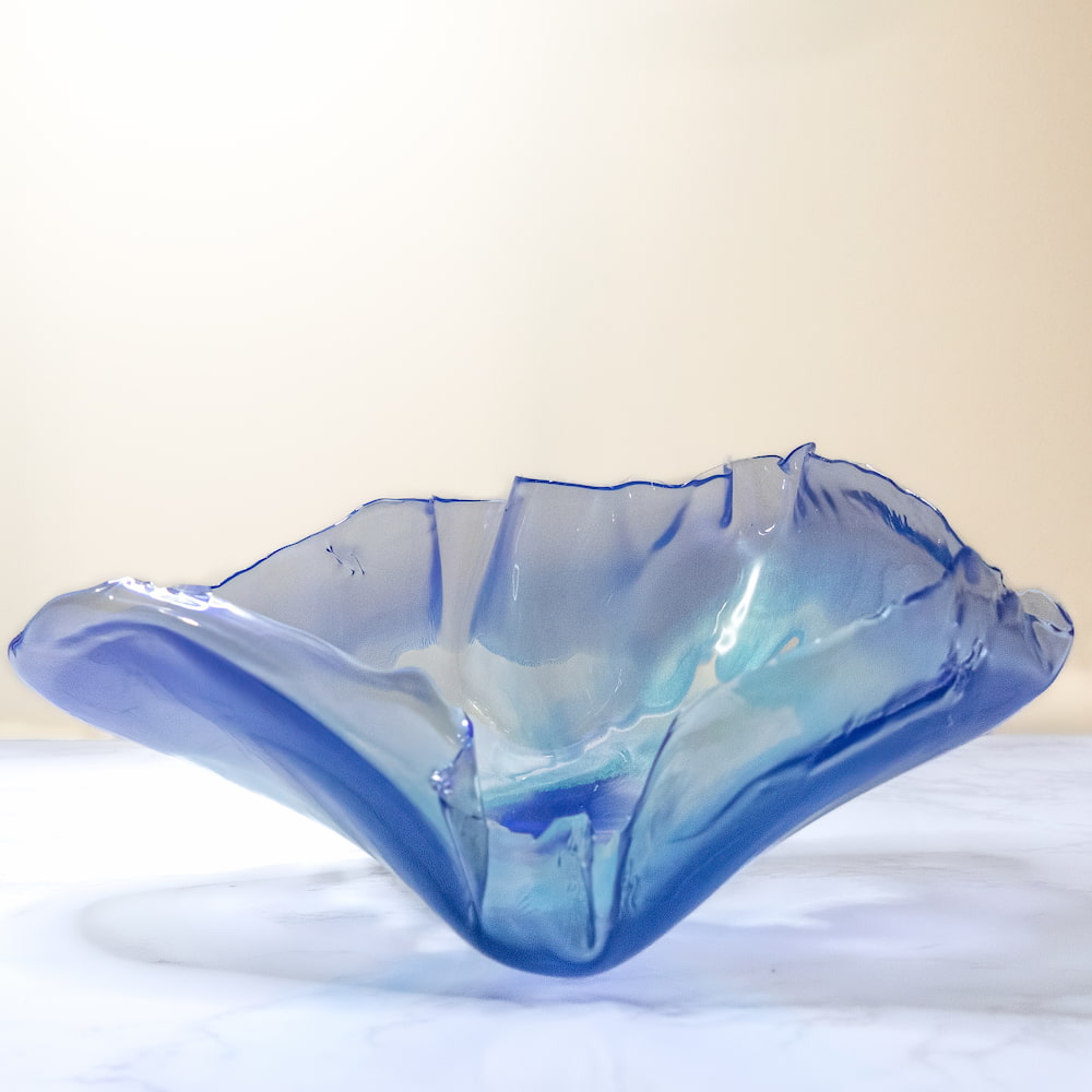 Blue resin irregular shaped bowl.