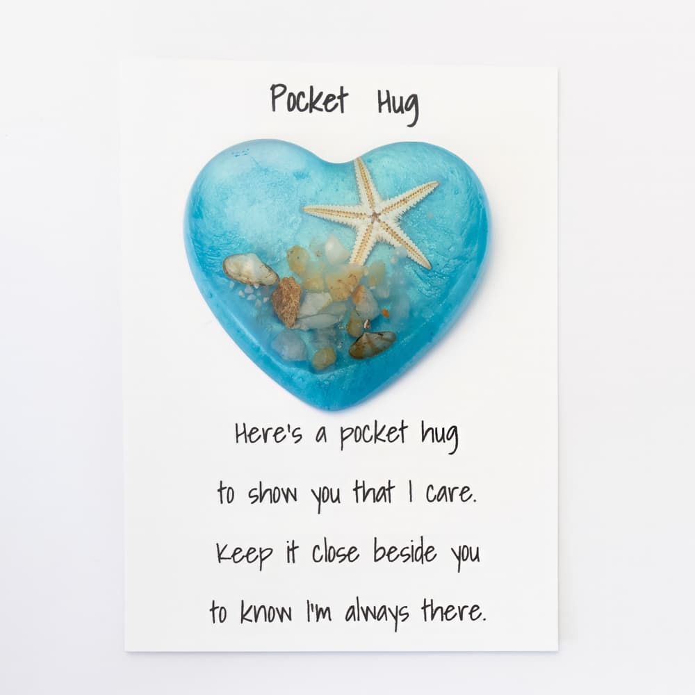 Sample of an ocean themed resin pocket hug with text that reads: Here's a pocket hug to show you that I care. Keep it close beside you to know I'm always there. 